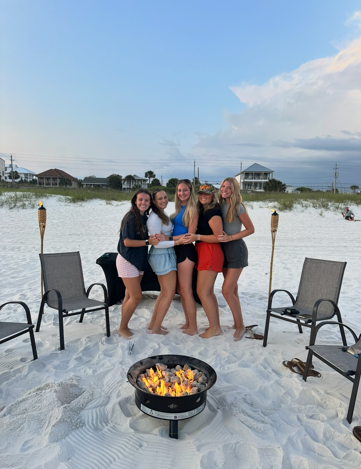 Friends at beach bonfire